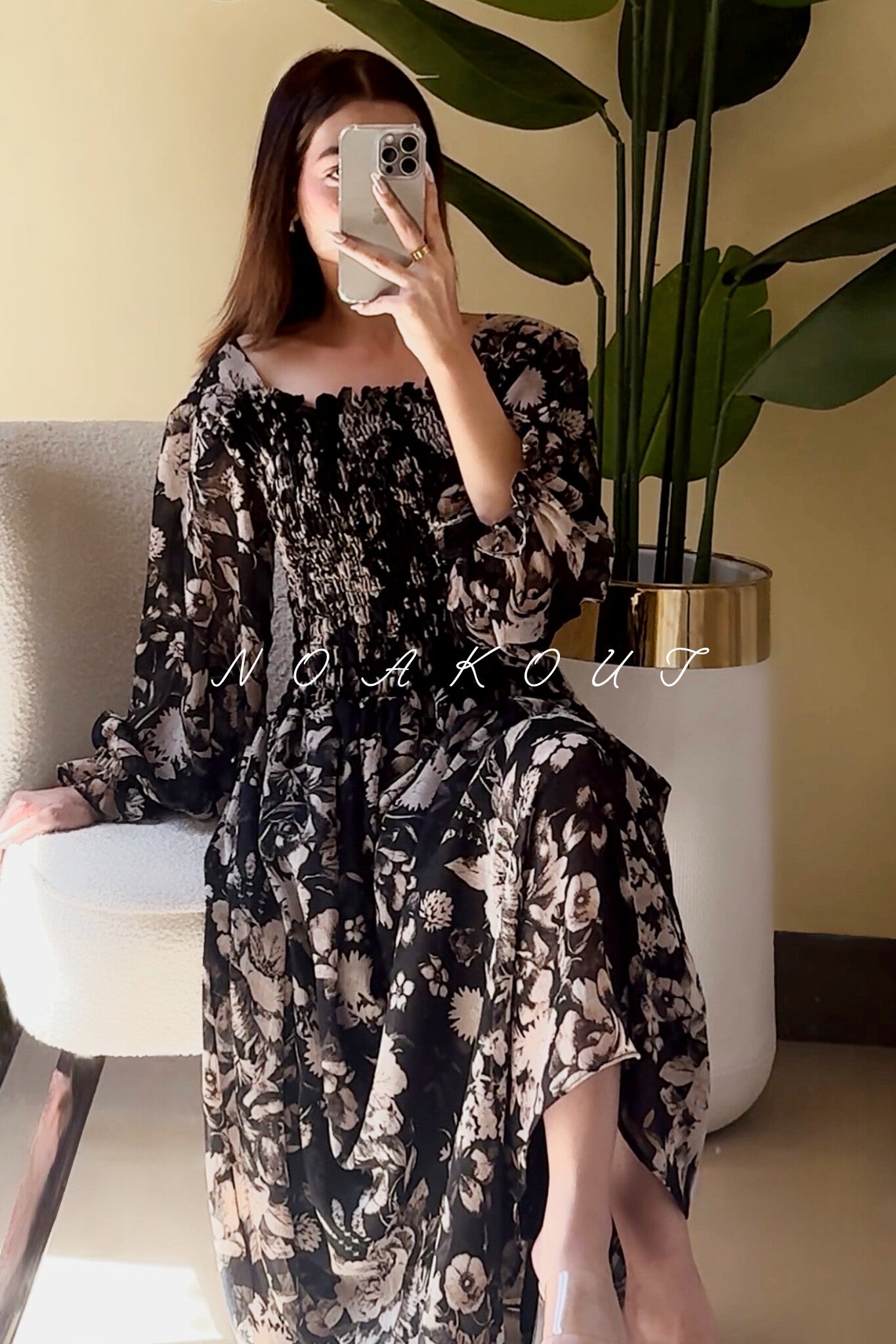 { BLACK FLORAL SMOCKED DRESS }